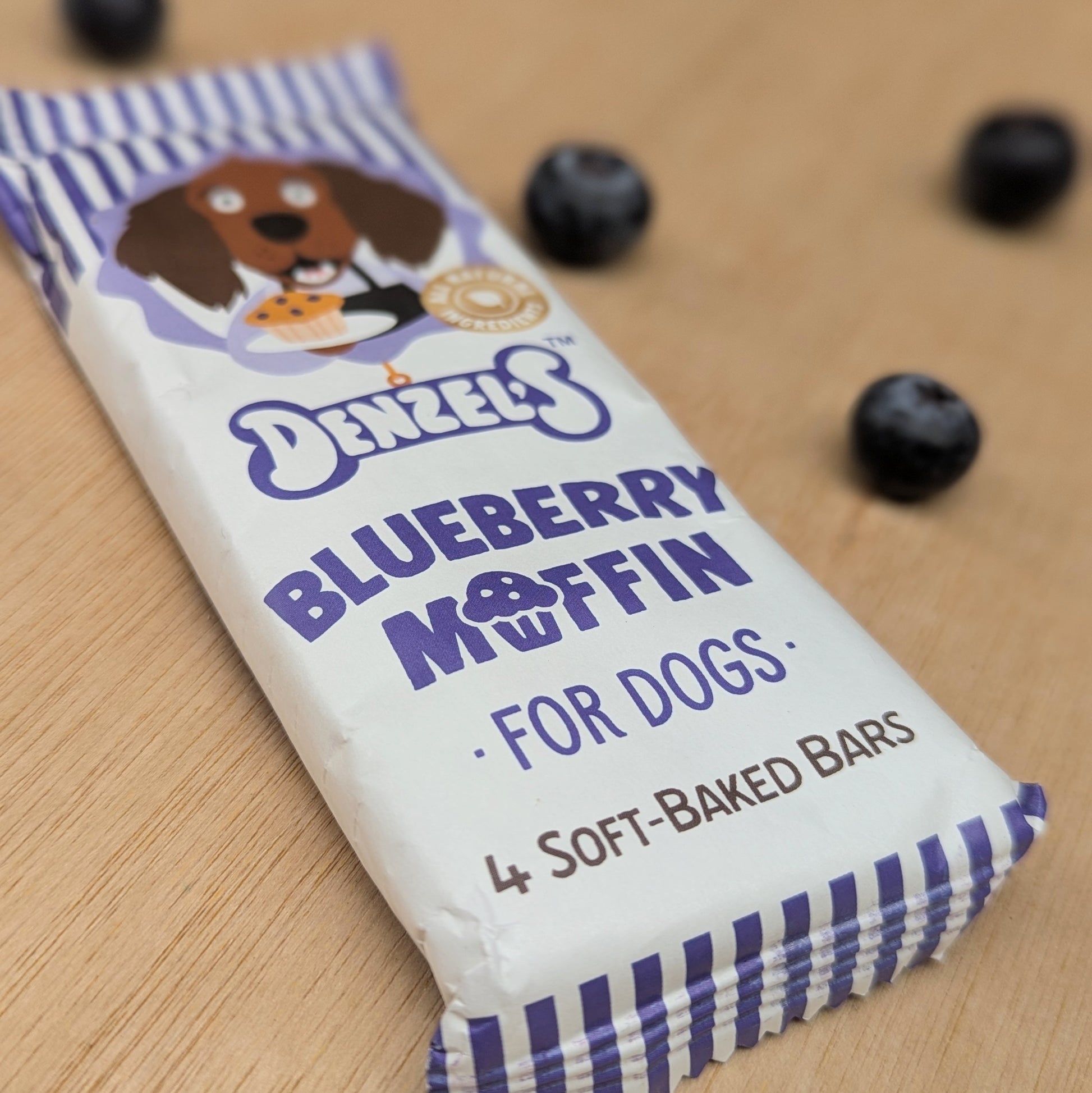 A close up of the words "blueberry Muffin for dogs, 4 soft-baked bars"