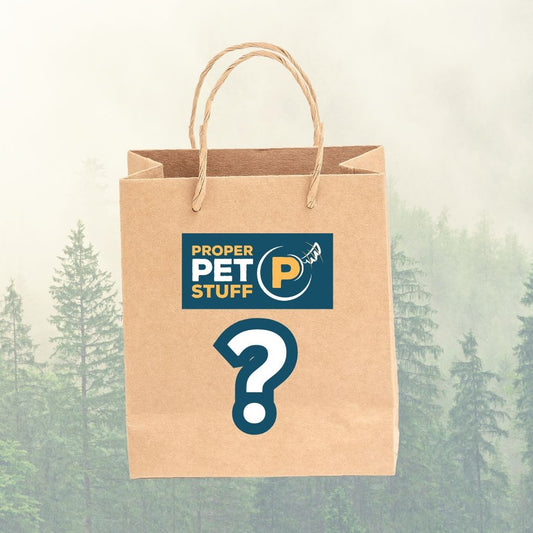 Brown paper bag with 'Proper Pet Stuff' logo and question mark on a forest background