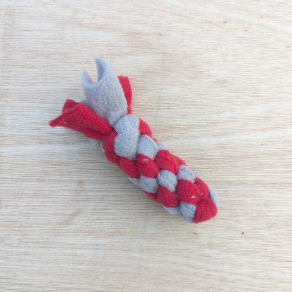 a 10cm red and grey, woven fleece tug scent toy